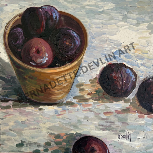 Still life painting of plums in a woven basket on a textured surface by Bernadette Devlin.