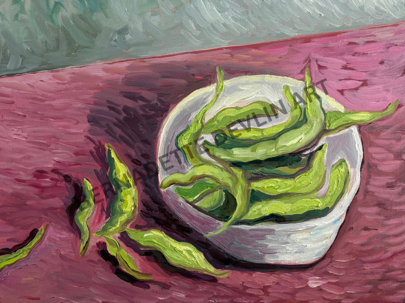 Bowl of edamame beans with pink background.