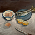 Still life with fish, eggs, and lemons on a table.