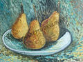 Three pears on a plate with blue background.